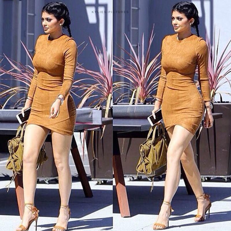 kylie jenner brown suede dress Kylie Jenner wears blue contacts and tight suede mini-dress